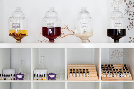 glass dispensers filled with botanical tinctures for perfume
